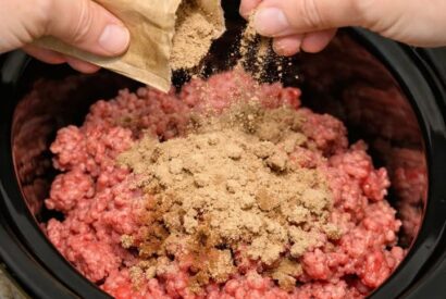 Thumbnail for Sprinkle brown gravy mix over ground beef, coupled with 2 other ingredients, into slow cooker for a filling dinner that’s the one everyone asks for
