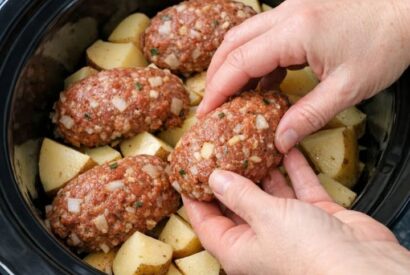 Thumbnail for Place mini meatloaves onto potatoes, paired with 3 ingredients, into slow cooker for a savory dinner that I crave this week after week