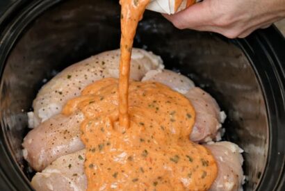 Thumbnail for Pour creamy tomato basil soup and these 4 ingredients over chicken breasts into a slow cooker for the kind of cozy dinner you’ll want on repeat