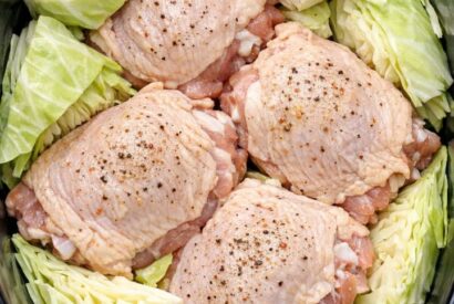 Thumbnail for Throw raw cabbage wedges and chicken thighs in the slow cooker and add 3 simple ingredients. You get a meal so delicious your husband will be begging for more, and it’s perfect for the upcoming holida