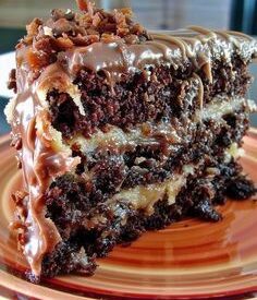 Thumbnail for White German Chocolate Cake with a Cheesecake Center
