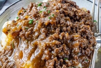 Thumbnail for Ground Beef and Gravy Over Mashed Potatoes