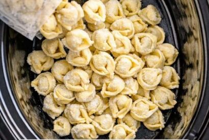 Thumbnail for Add frozen tortellini into the slow cooker, toss in a few extras, and it turns into an easy, comforting dinner.