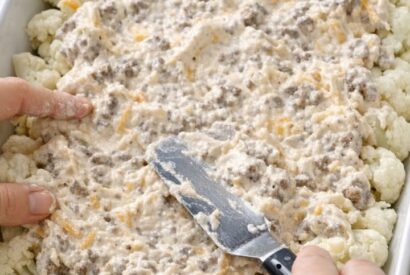 Thumbnail for Spread this 1 creamy mixture over raw cauliflower florets into a baking dish for a low carb bake that tastes like you put in way more effort