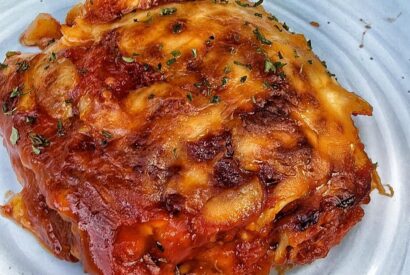 Thumbnail for Baked Ravioli With Caramelized Onion Marinara