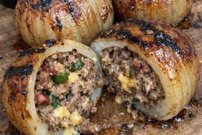 Thumbnail for Firecracker Bacon Cheddar Cheeseburger Stuffed Onion Bomb