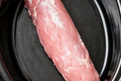 Thumbnail for Dump a whole pork tenderloin in the slow cooker with 3 simple ingredients and your husband will swear you spent all day cooking.