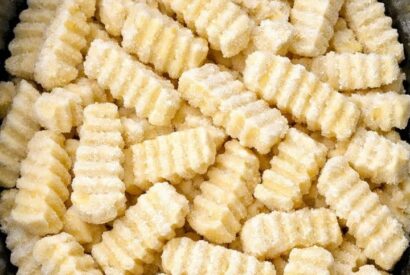 Thumbnail for Dump frozen crinkle-cut potato slices in the crock and 3 simple additions to get a side dish so delicious, your whole family will be begging for more!