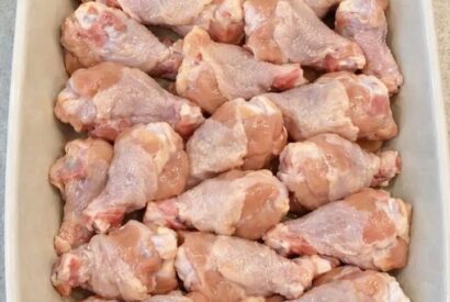 Thumbnail for Dump raw chicken into the baking pan with 4 other simple things and get a dinner so good your friends will be asking for the recipe all week.