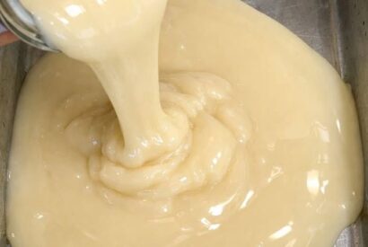 Thumbnail for Pour a can of raw sweetened condensed milk right into the roasting pan with 2 other ingredients and your friends will be begging you for this secret r