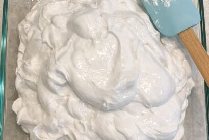 Thumbnail for Dump a whole jar of marshmallow fluff in the baking dish and 3 other ingredients and you’ll have a dessert so irresistible your family will be licking
