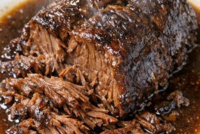 Thumbnail for My uncle passed down this secret for the perfect festive dinner. Just 3 ingredients drop into the pot for incredibly rich and pull apart tender meat
